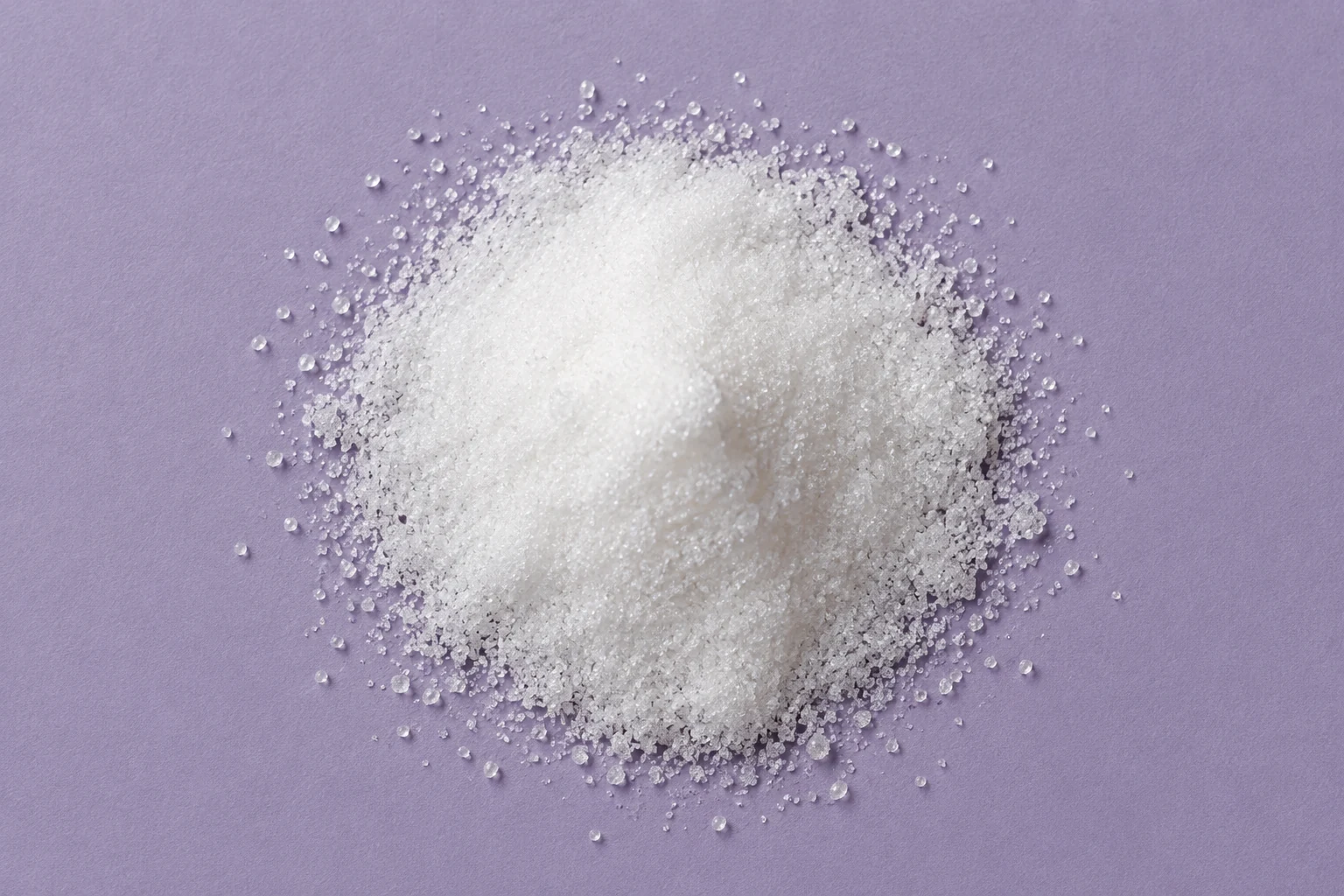 White D-mannose crystals on pale lavender